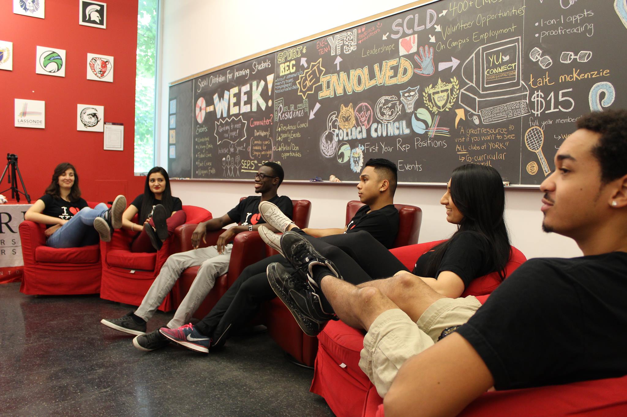 Members of the RED Zone hold a team meeting in a classroom at York University.